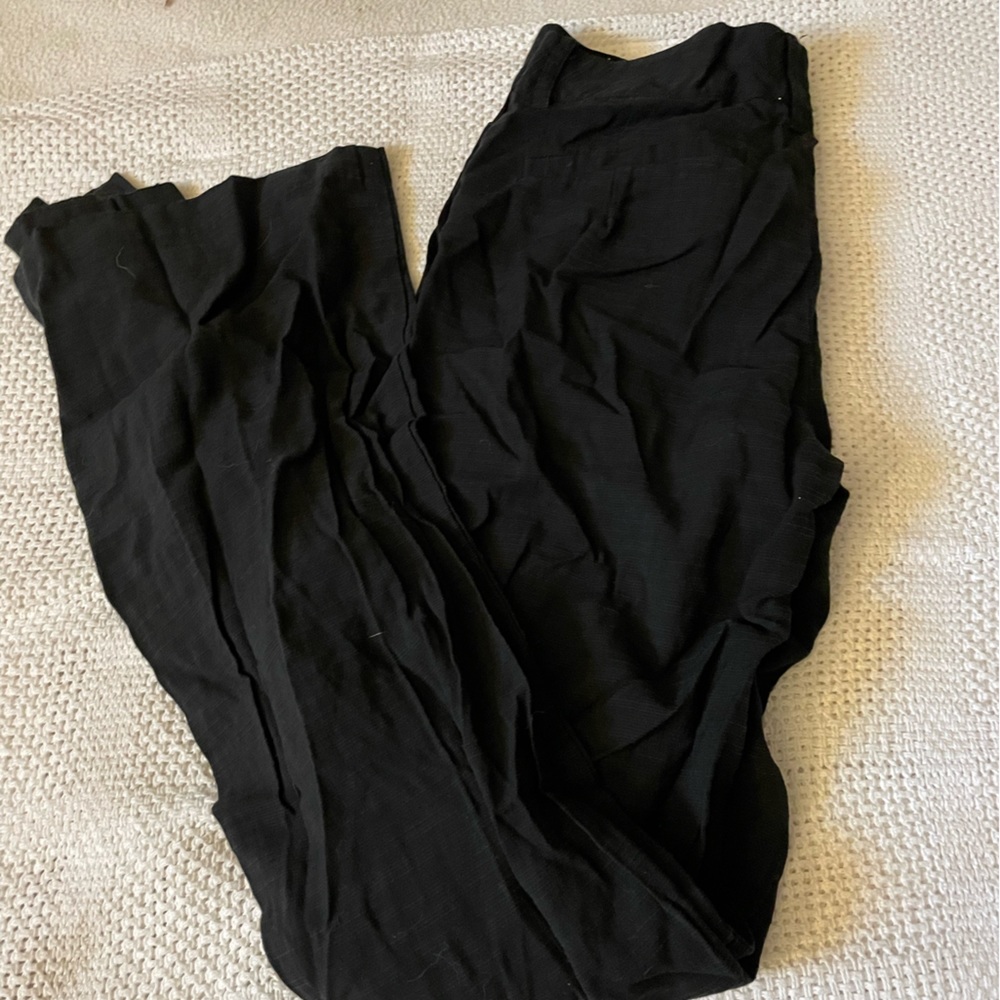 Black trousers with satin edge.